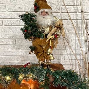 Santa Claus dressed in gorgeous gold for Christmas